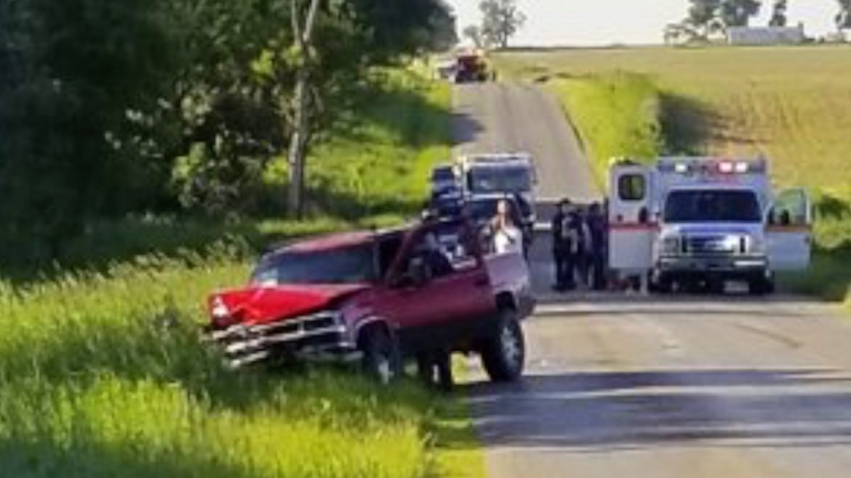 A damaged truck sits on the side of the road after an accident involving a horse-drawn carriage in California Township, Mich., on June 7, 2019. (Don Reid/The Daily Reporter via AP)
