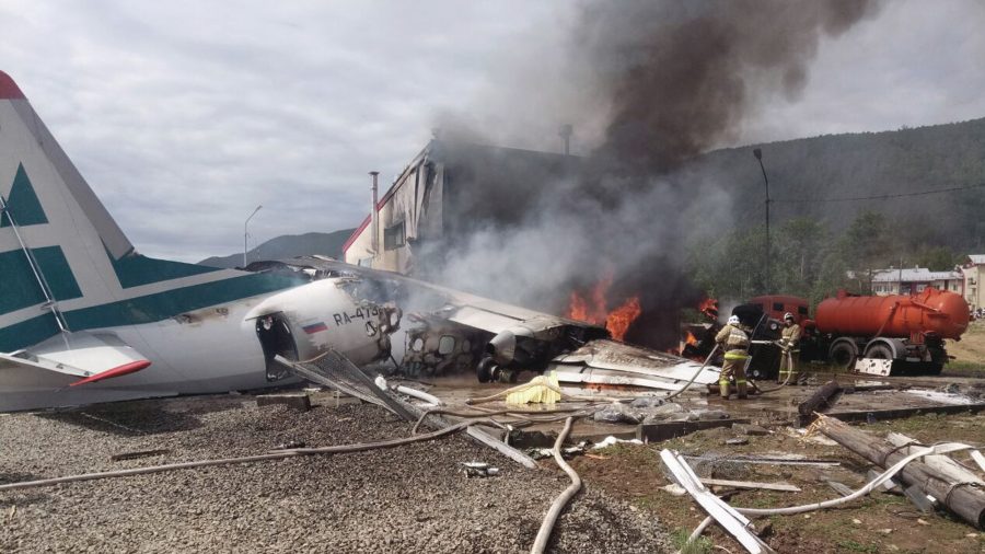 Plane Skids Off Runway, Killing 2 Crew Members and Injuring Dozens of Passengers