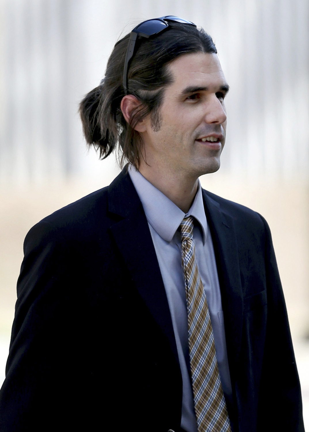 In this 2018 photo, Scott Daniel Warren, who is charged with human smuggling walks in to U.S. District Court in Tucson, AZ. (Kelly Presnell/Arizona Daily Star via AP)