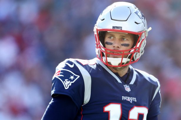 Tom Brady #12 of the New England Patriots looks on during the game against the Miami Dolphins at Gillette Stadium in Foxborough, Mass., on Sept. 30, 2018. (Maddie Meyer/Getty Images)