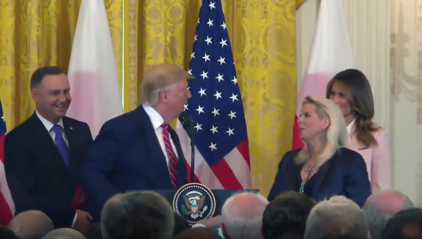 Donald Trump greets CBS correspond Rita Cosby, during an event at which the Polish President is visiting the White House on June 12, 2019. (The White House)