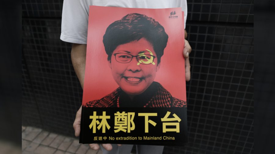 Activists Call for Hong Kong Leader Carrie Lam to Resign After She Suspends Bill