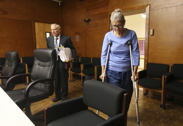 Leslie Van Houten enters with her attorney Rich Pfeiffer before her parole board hearing at the California Institution for Women in Corona, Calif., on Sept. 6, 2017. (Stan Lim/Los Angeles Daily News via AP)