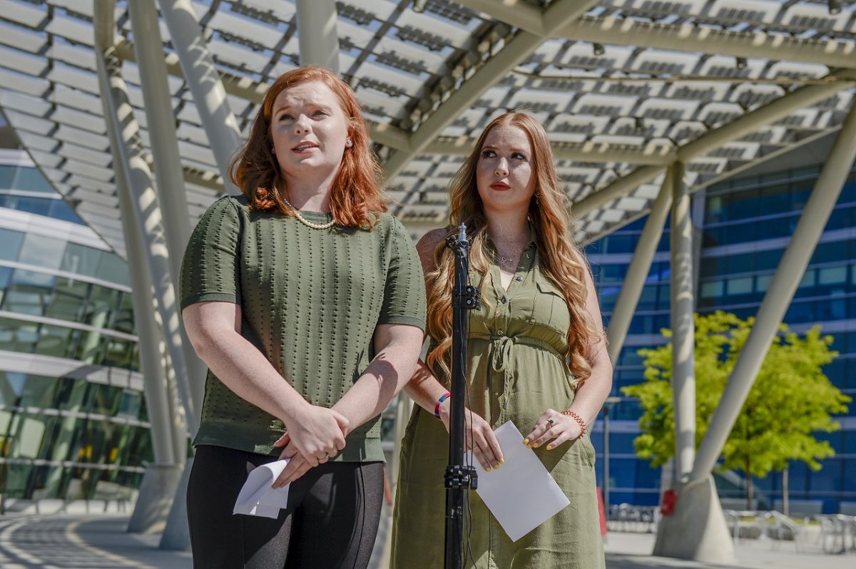 Ashley Fine and Kennedy Stoner, close friends of missing person Mackenzie Lueck, speak during a press conference outside the Salt Lake City Police Department in Salt Lake City, on June 23, 2019. (Leah Hogsten/The Salt Lake Tribune via AP)