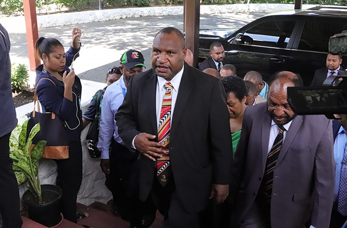 Papua New Guinea's Prime Minister, James Marape (C), arrives at the house of Governor-General Bob Dadae in Port Moresby on May 30, 2019. (GORETHY KENNETH/AFP/Getty Images)