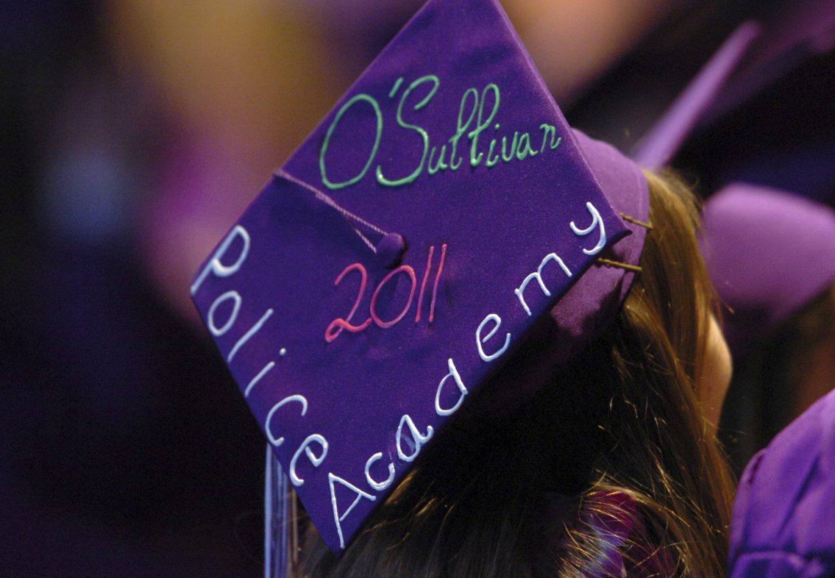 Tara O'Sullivan applauds during College Park High School's commencement ceremony in Concord, Calif. on June 6, 2011. (File photo/Karl Mondon/Bay Area News Group via AP)