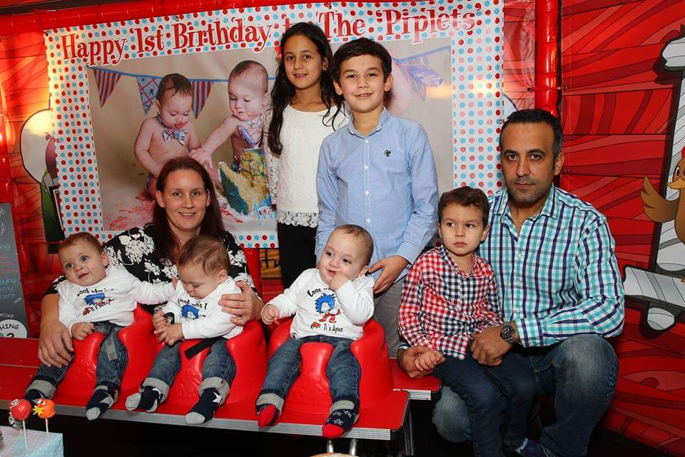 Mother and father Claire and Gurcan with their six children. (Claire Cerikci)
