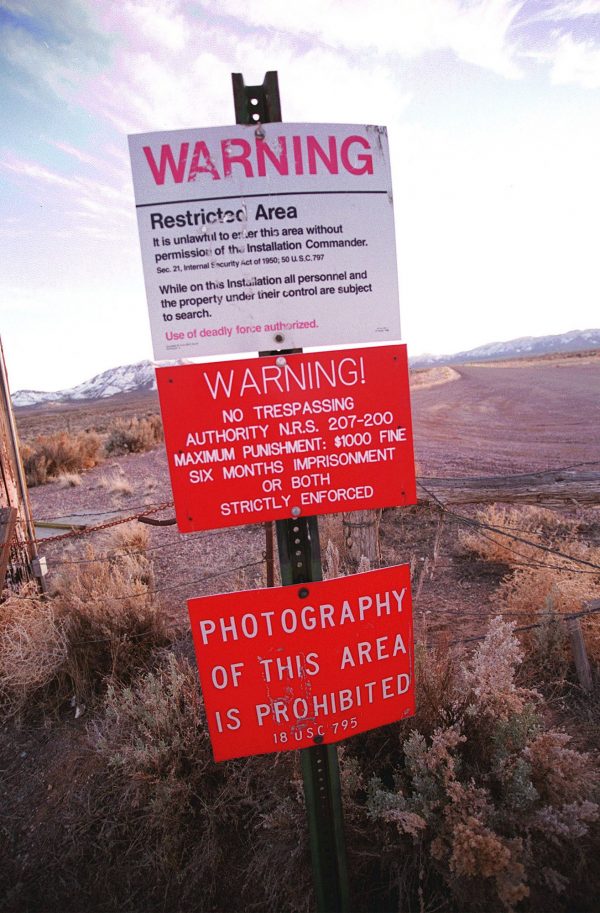 A warning sign marking the boundary of Area 51, in Rachel, Nev., on March 12, 2000. (Dan Callister/Getty Images)