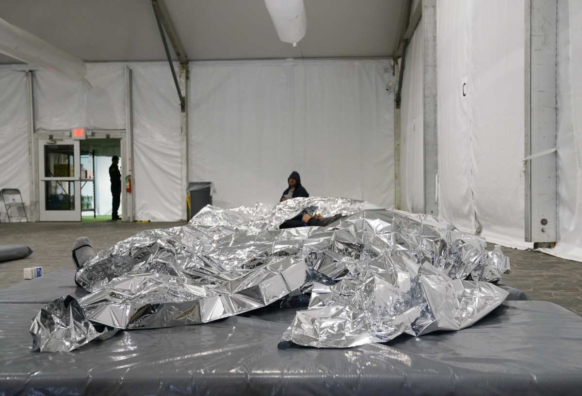 Asylum-seekers rest in the Donna Holding Facility in Donna, Texas on July 12, 2019. (Veronica G. Cardenas/Reuters)