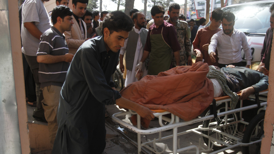 Roadside Bomb Hits Bus in Afghanistan, Killing at Least 35 and Wounding 27