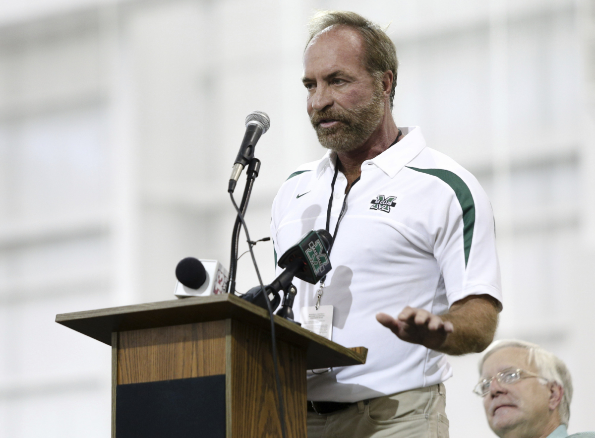 Chris Cline speaks as Marshall University dedicates the new indoor practice facility as the Chris Cline Athletic Complex in Huntington, W.Va., on Sept. 6, 2014. (Sholten Singer/The Herald-Dispatch via AP)