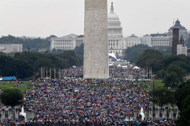 People gather on the National Mall as they wait for President Donald Trump to speak at the Lincoln Memorial in Washington July 4, 2019. (Susan Walsh/AFP/Getty Images)