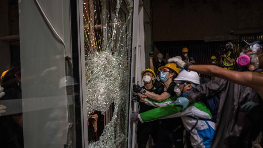 Questions Arise in Hong Kong: Did Police Allow Protesters to Storm the Legislature?