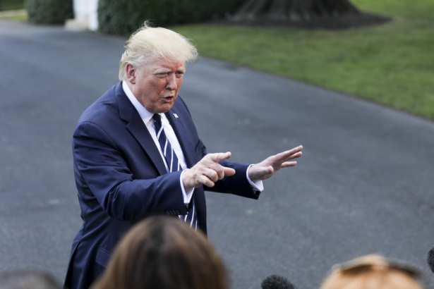 President Donald Trump speaks to media before departing the White House on Marine One en route to Bedminster, N.J., on July 19, 2019. (Charlotte Cuthbertson/The Epoch Times)