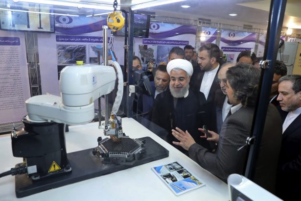 Iranian President Hassan Rouhani at a ceremony to mark "National Nuclear Day," in Tehran, Iran on April 9, 2018. (Iranian Presidency Office/File Photo via AP)