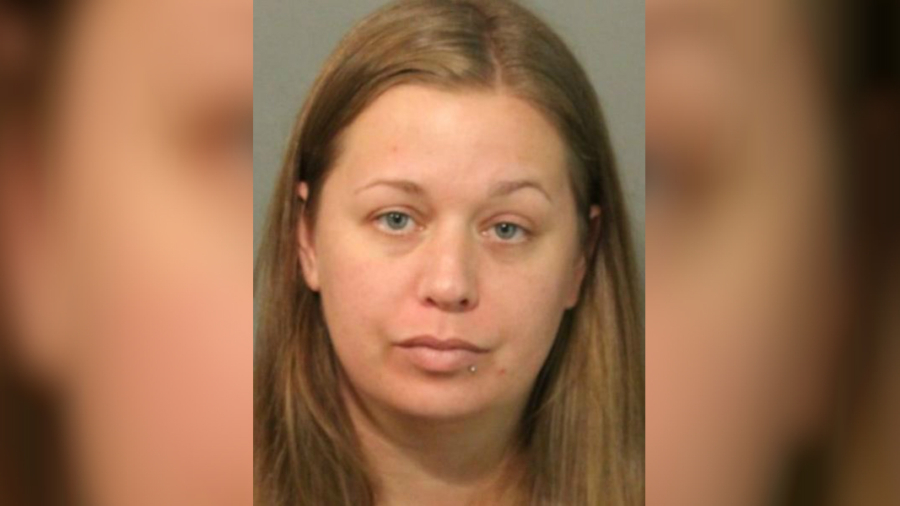 Police Arrest Mom After Girl Seen on Video Licking Tongue Depressor, Putting It Back