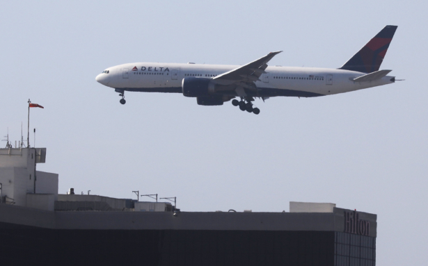 A Delta Air Lines plane lands in a file photograph. (Mario Tama/Getty Images)
