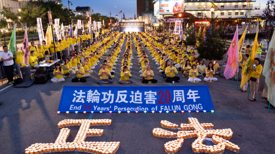 Candlelight Illuminates the Memory of Lives Lost in 20 Year Persecution in China