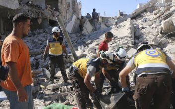 Syrian Activists Say Airstrikes Kill 27 in Rebel-Held Town