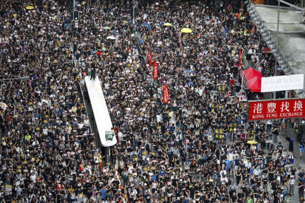 Protesters take part in a march on a street