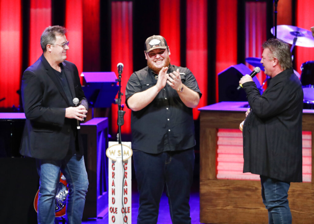 Vince Gill, left, and Joe Diffie, right, welcome Luke Combs to the Grand Ole Opry at "Luke Combs Joins the Grand Ole Opry Family," 