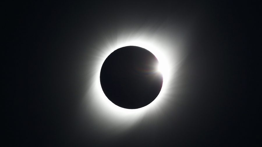 Chileans, Argentines Gape at Total Solar Eclipse in Rare, Irresistible