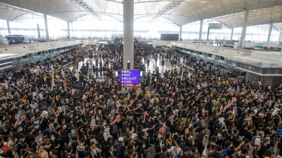 Hong Kong’s Airport Reopens on Tuesday After Unprecedented Closure