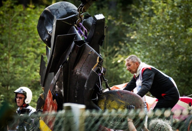Track marshals lift the damaged car of BWT Arden's French driver Anthoine Hubert onto a truck following a serious accident involving several drivers during a Formula 2 race at the Spa-Francorchamps circuit in Spa, Belgium, on August 31, 2019. (REMKO DE WAAL/AFP/Getty Images)