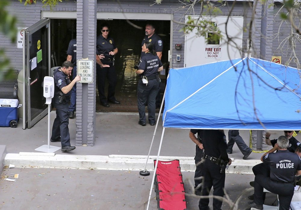 A police staging area at the south entrance of the Rehabilitation Center at Hollywood Hills where residents died, in Hollywood, Fla., on Sept. 13, 2017. (Charles Trainor Jr./Miami Herald via AP, File)