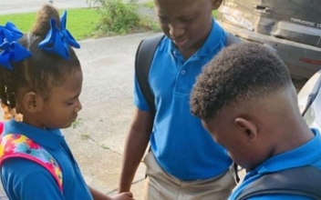 First Day of School Photo of Siblings Praying Goes Viral