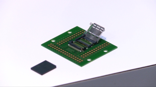 Toshiba shows their latest and smallest form factor for SSDs that can be easily removed without damaging the card on August 6, 2019. (Jeffery Chen/NTD)