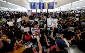Flights Canceled Out of Hong Kong Airport As Protesters Flood Terminal