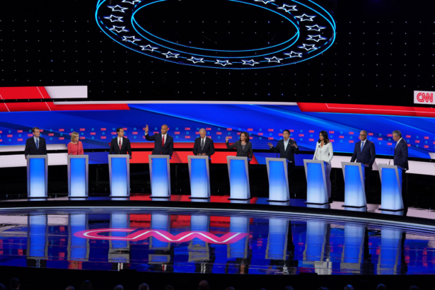 Democratic presidential candidates Sen. Michael Bennet (D-Colo.) (L-R), Sen. Kirsten Gillibrand (D-N.Y.), former housing secretary Julian Castro, Sen. Cory Booker (D-N.J.), former Vice President Joe Biden, Sen. Kamala Harris (D-Calif.) , former tech executive Andrew Yang, Rep. Tulsi Gabbard (D-Hawaii), Washington Gov. Jay Inslee, and New York City Mayor Bill De Blasio during the Democratic Presidential Debate in Detroit, Michigan at the Fox Theatre on July 31, 2019. (Scott Olson/Getty Images)