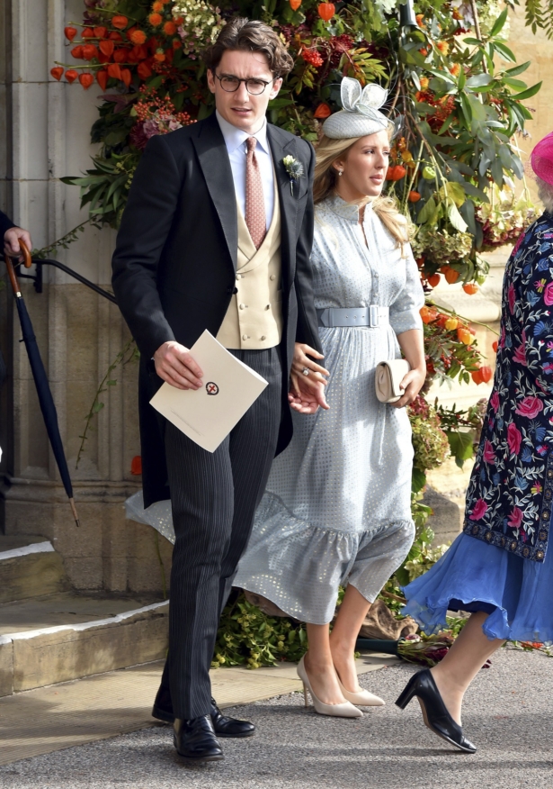 Caspar Joplin, left, and singer Ellie Goulding depart after the wedding of Princess Eugenie of York and Jack Brooksbank at St George's Chapel, Windsor Castle, near London, England, Oct. 12, 2018. (Matt Crossick, Pool via AP, File)