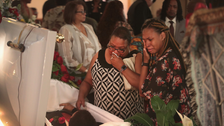 Families Mourn, Bury Those Killed in Ohio and Texas Massacres