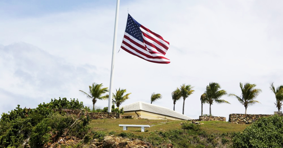 An American flag flies at half staff on Little St. James Island, in the U. S. Virgin Islands, a property owned by Jeffrey Epstein, Wednesday, Aug. 14, 2019. (Gabriel Lopez Albarran/AP)