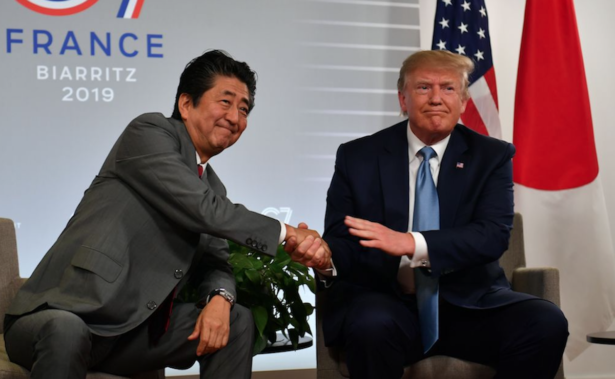 President Donald Trump (R) shakes hands with Japan's Prime Minister Shinzo Abe during a bilateral meeting at the Bellevue in Biarritz, south-west France on Aug. 25, 2019. (NICHOLAS KAMM/AFP/Getty Images)