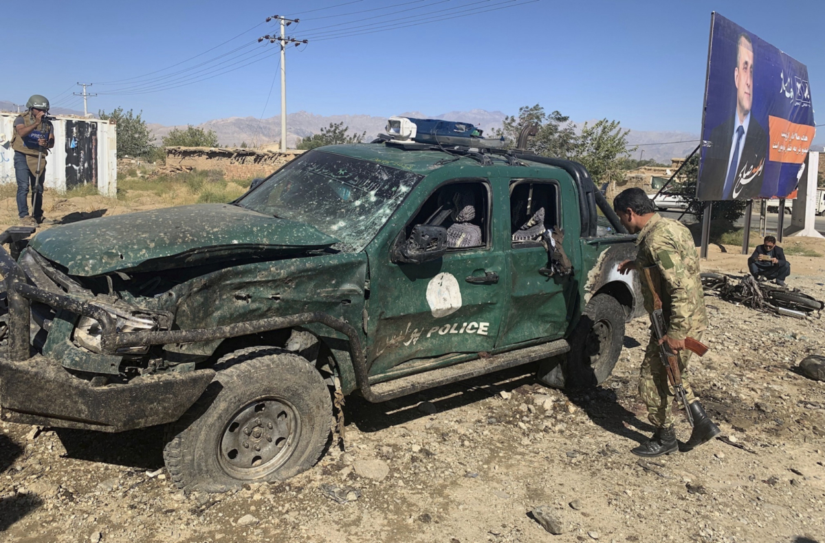 Afghan police inspect the site of a suicide attack, in Parwan province of Afghanistan on Sept. 17, 2019. (Rahmat Gul/AP Photo)