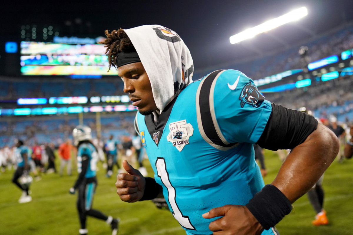 Cam Newton #1 of the Carolina Panthers runs off the field after their game against the Tampa Bay Buccaneers at Bank of America Stadium in Charlotte, N.C., on Sept. 12, 2019. (Jacob Kupferman/Getty Images)