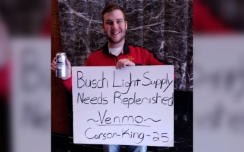 Man Who Raised Over $1 Million Holding ‘Beer Money’ Sign Says He’s Donating It to Children’s Hospital