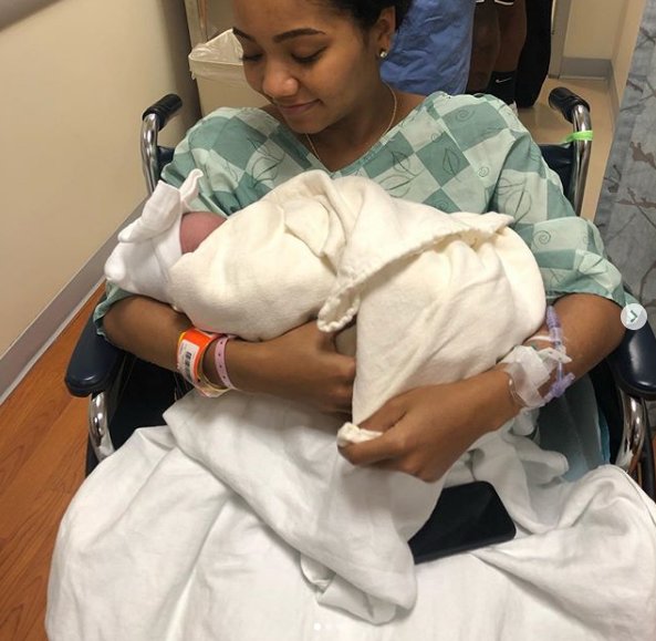 Cleveland Browns defensive end Chris Smith's girlfriend Petara Cordero holds their newborn daughter Haven Harris Smith. (Courtesy of Chris Smith/Instagram)
