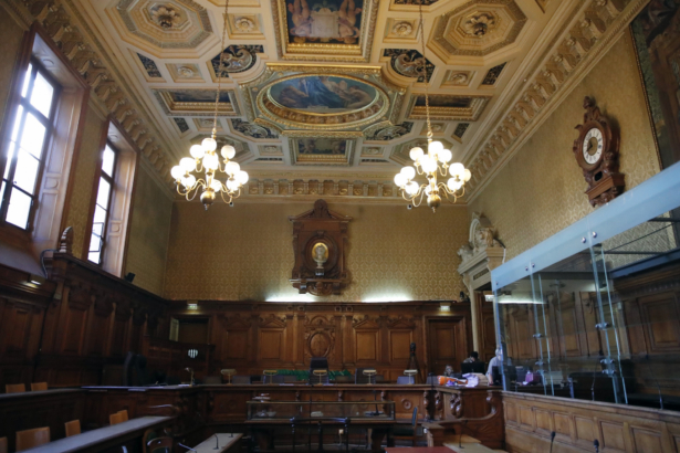Courtroom where eight people are going on trial in relation to a bungled terrorist plot against Notre Dame Cathedral, in Paris, Monday, Sept. 23, 2019. (Francois Mori/AP Photo)