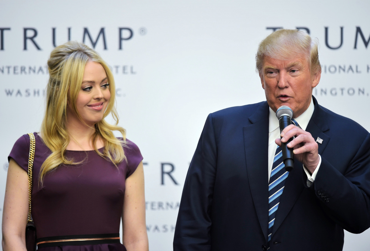 Republican presidential nominee Donald Trump speaks during a ribbon cutting ceremony as his daughter Tiffany looks on at the grand opening of the Trump International Hotel in Washington on Oct. 26, 2016. (Mandel Ngan/AFP/Getty Images)
