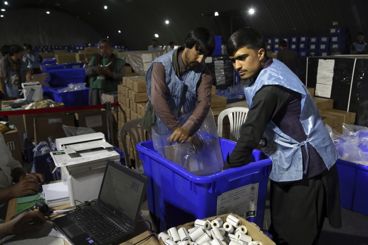 Election commission workers prepare ballot boxes and election materials for the presidential election scheduled for Sept. 28, at the Independent Election Commission compound in Kabul, Afghanistan on Sept. 15, 2019. (Rahmat Gul/AP Photo)