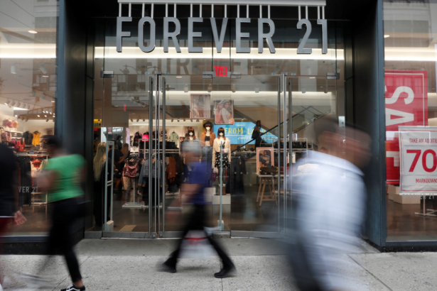 People walk by the clothing retailer Forever 21 in New York City on Sept. 12, 2019. (Shannon Stapleton/Reuters)