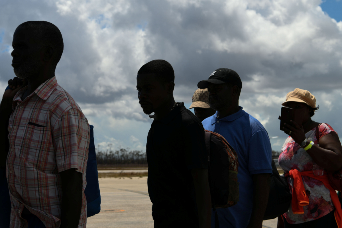Members of the Bahamian military ride in the back of a truck in the wake of Hurricane Dorian in Marsh Harbour, Great Abaco, Bahamas on Sept. 7, 2019. (Loren Elliott/Reuters)