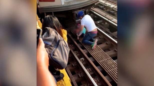 A man holding his 5-year-old daughter jumped in front of a subway train in New York City on Sept. 23, 2019. (Video screenshot/Courtesy of Nasia Jenkins)