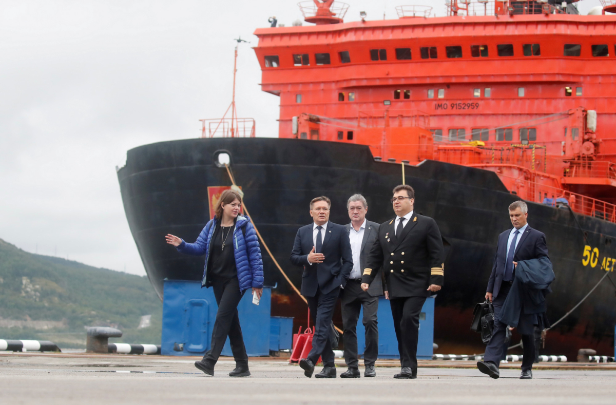 General Director of Russian state nuclear agency Rosatom Alexei Likhachev (C) speaks with General Director of Rosatomflot Mustafa Kashka as they attend a farewell ceremony before the floating nuclear power plant Akademik Lomonosov leaves the service base for a journey along the Northern Sea Route to Chukotka from Murmansk, Russia on Aug. 23, 2019. (Maxim Shemetov/File Photo/Reuters)