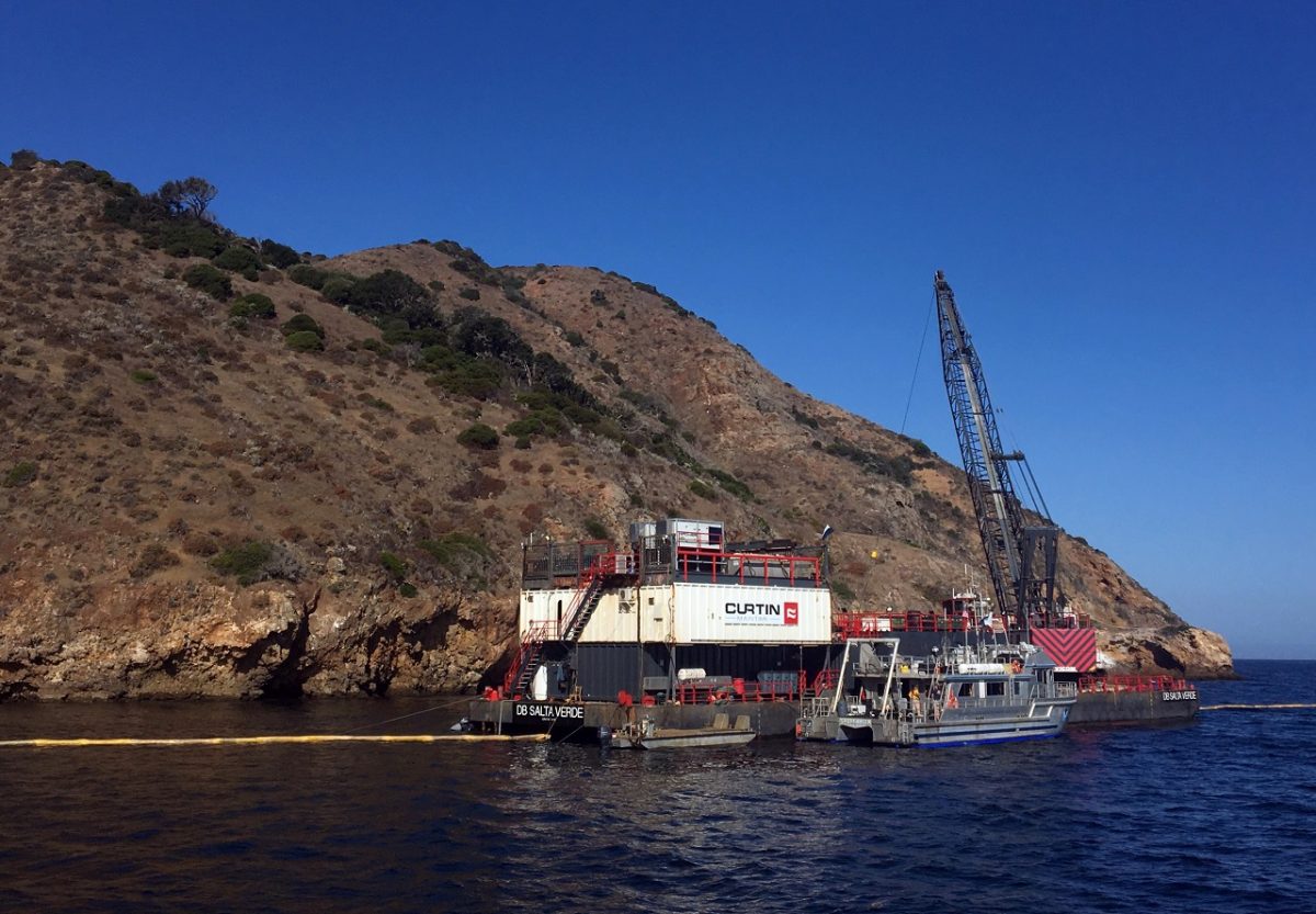 The derrick barge Salta Verde engaged in salvage operations over the wreck of the dive boat Conception at Santa Cruz Island off the coast of Southern Calif., on Sept. 6, 2019. (U.S. Coast Guard via AP)