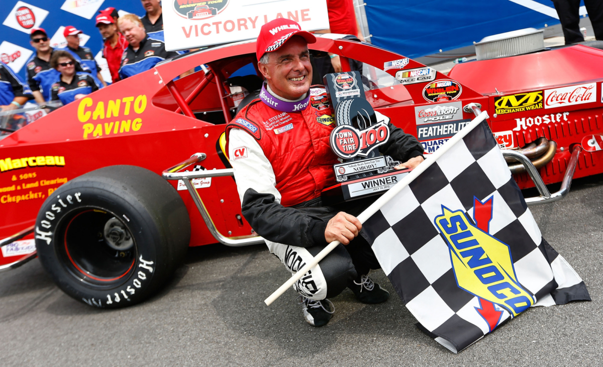Mike Stefanik, a NASCAR legend, in a 2012 file photo after winning the NASCAR Whelen Modified Tour Town Fair Tire 100 at New Hampshire Motor Speedway. (Jared Wickerham/Getty Images for NASCAR)